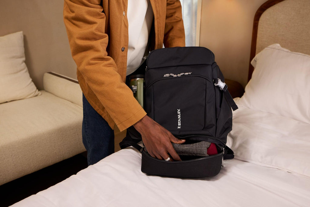 Hydration Bag with Drinkware Compartment and Adjustable Strap